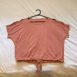 Lululemon tee with tie bottom and cut out shoulders